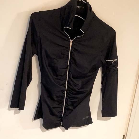 Bebe sport light weight zip jacket / top